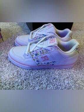 DC Girls' White Sneakers with Pink Trim and Multicolor Logo